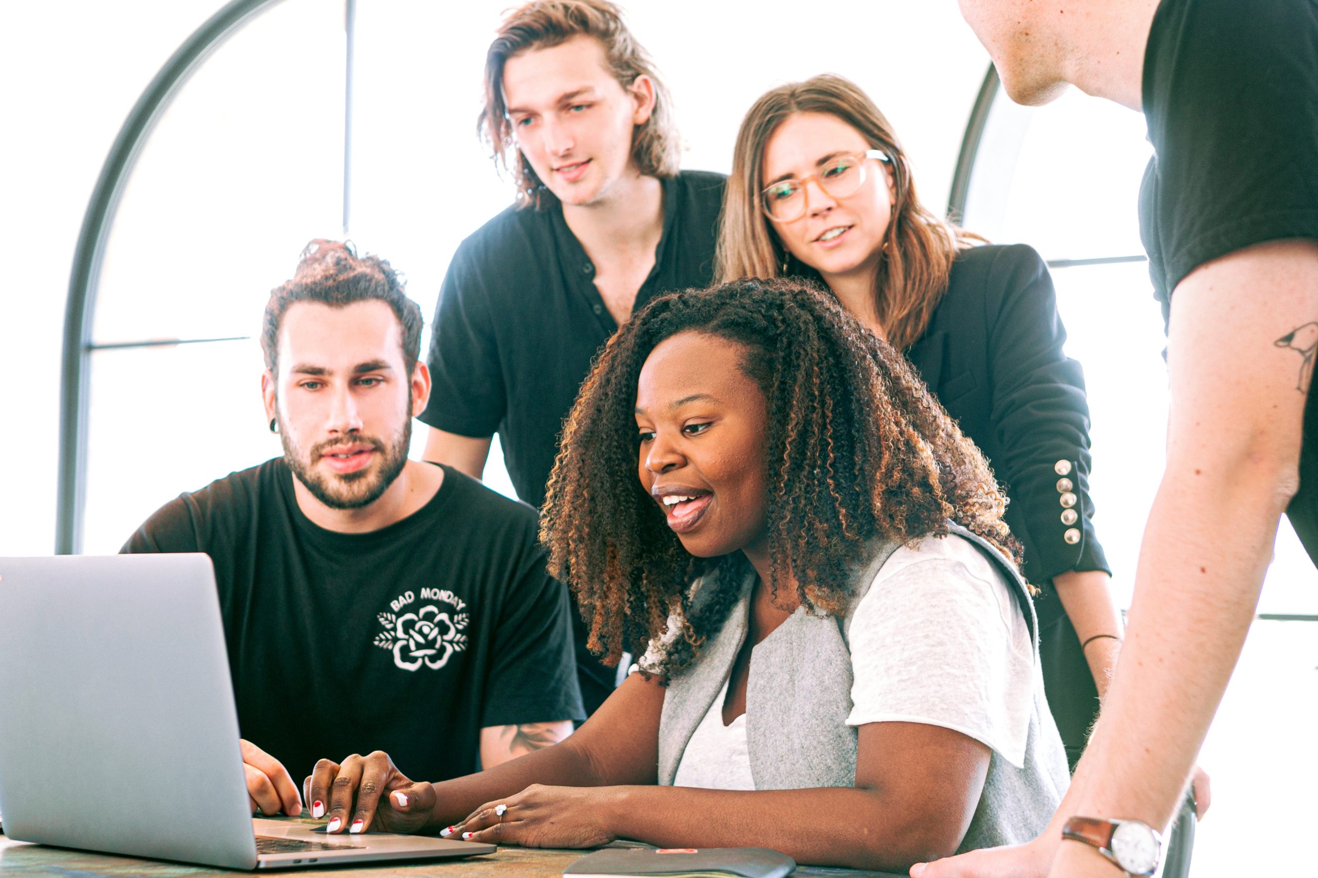 woman-sharing-her-presentation-with-her-colleagues-3153198